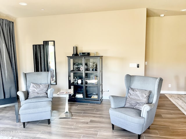 6145 E Cave Creek Rd Unit 203, Cave Creek, AZ 85331 - sitting room with light wood-style floors, recessed lighting, and baseboards