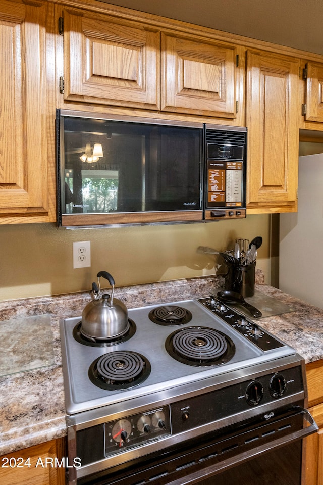 kitchen featuring stainless steel range oven