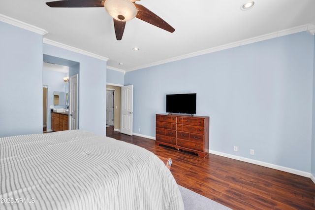 bedroom featuring ornamental molding, dark wood-type flooring, ensuite bathroom, and ceiling fan