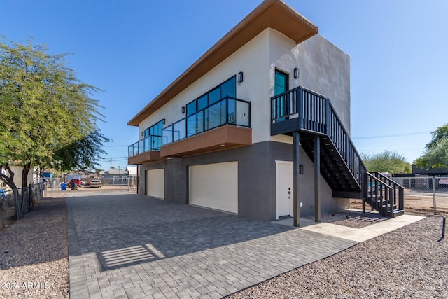 view of property exterior with a garage