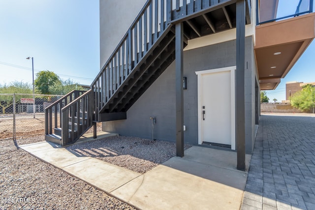 entrance to property with a patio area