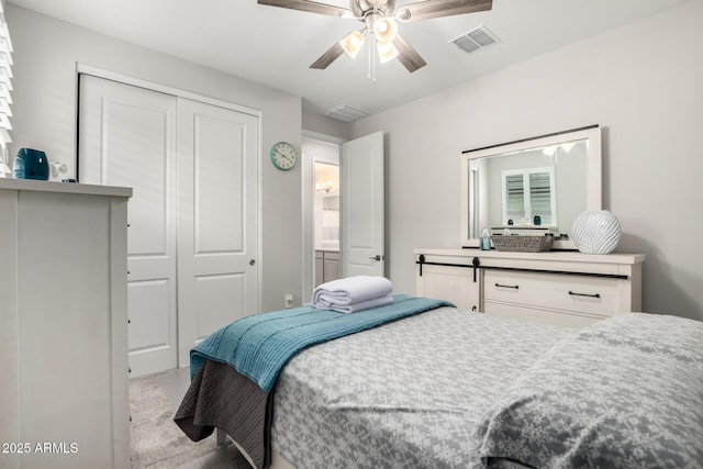 bedroom featuring a closet and a ceiling fan
