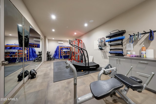 workout area with a wall mounted air conditioner