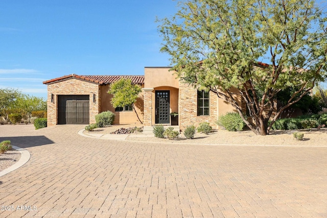 view of front of home featuring a garage