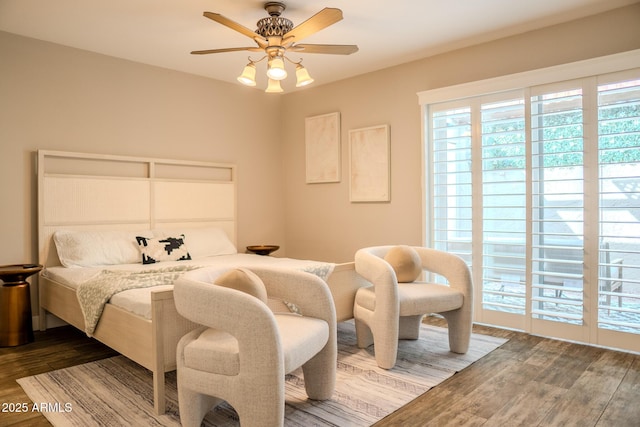 bedroom featuring hardwood / wood-style flooring and ceiling fan