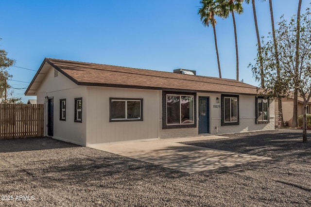 11025 E Cholla Rd, Mesa, AZ 85207 - view of front of property featuring a shingled roof, brick siding, and a patio area