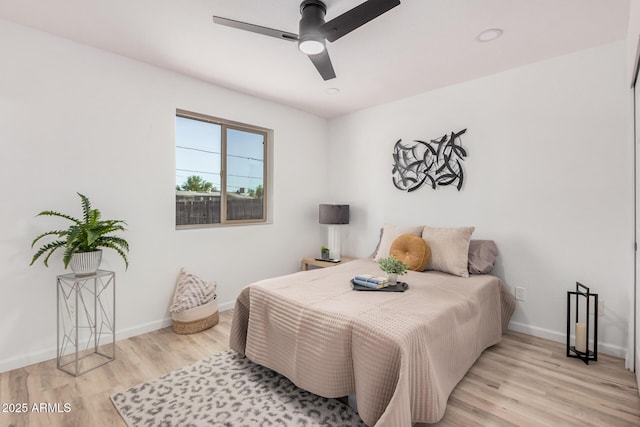 11025 E Cholla Rd, Mesa, AZ 85207 - bedroom featuring light wood-type flooring, baseboards, and ceiling fan