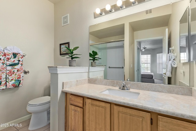 bathroom with visible vents, tile patterned flooring, toilet, and vanity