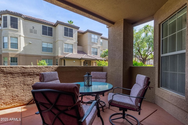 balcony featuring a residential view