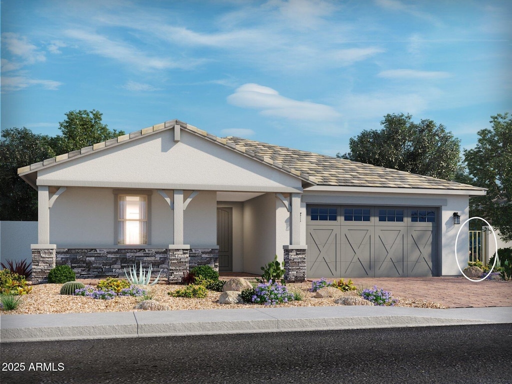 view of front of property featuring a garage