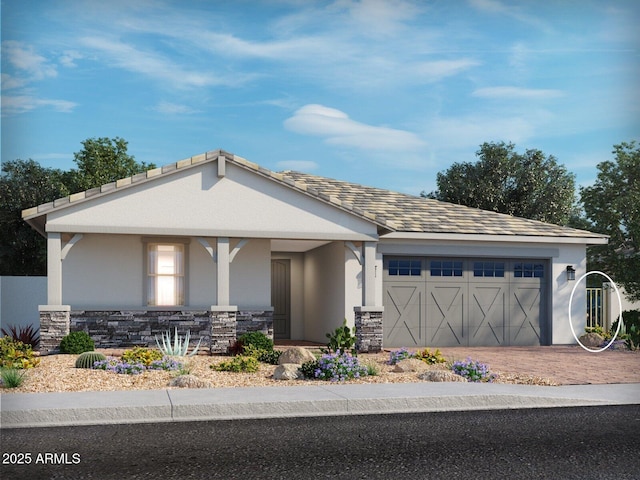 view of front of property featuring a garage