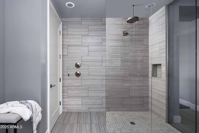 bathroom featuring tiled shower