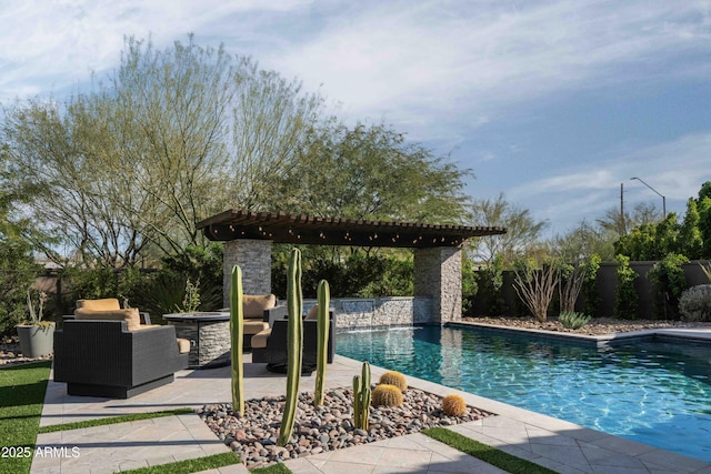 view of swimming pool featuring an outdoor living space and a patio area