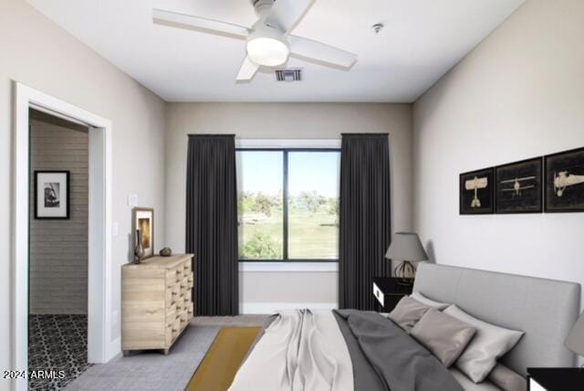 bedroom with ceiling fan and light colored carpet