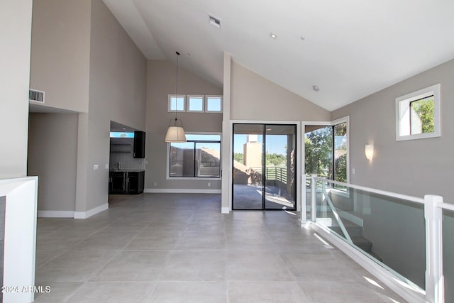 interior space featuring high vaulted ceiling