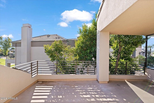 view of patio / terrace with a balcony