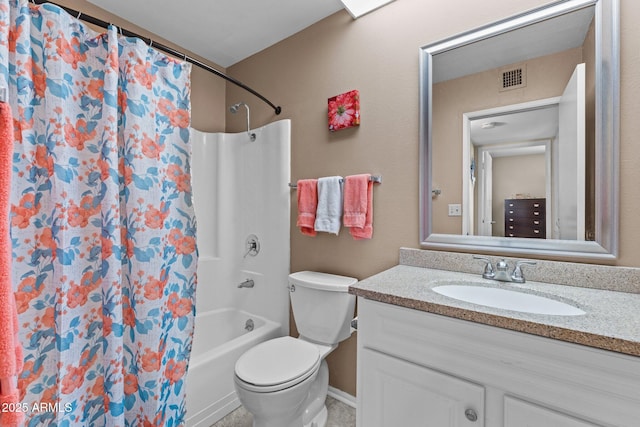 full bathroom with vanity, shower / tub combo, and toilet