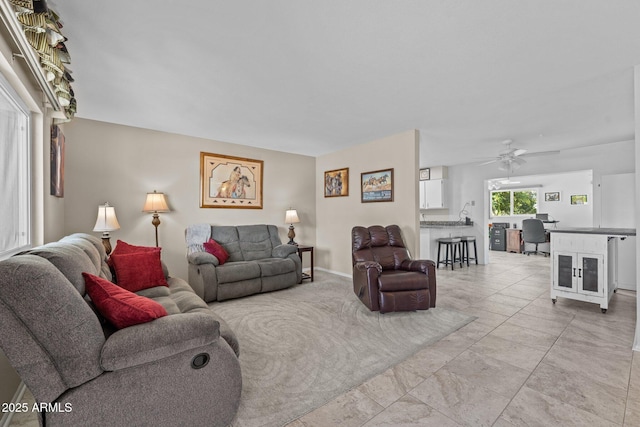 living room with ceiling fan