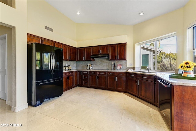 kitchen with sink, tasteful backsplash, light tile patterned floors, high vaulted ceiling, and black appliances