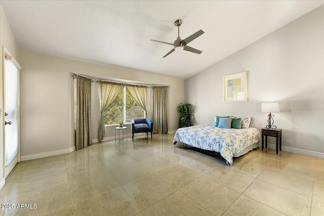 bedroom with light tile patterned flooring, ceiling fan, and lofted ceiling