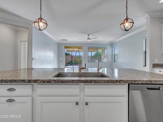 kitchen featuring ornamental molding, white cabinets, dishwasher, and a sink