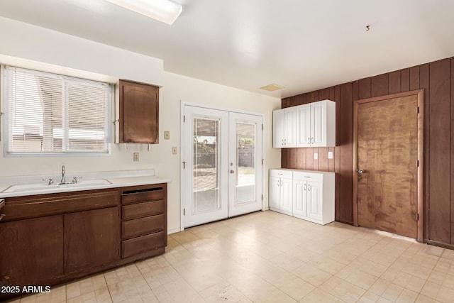 4343 E Union Hills Dr, Phoenix, AZ 85050 - kitchen featuring a sink, french doors, and light countertops