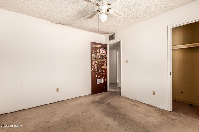 4343 E Union Hills Dr, Phoenix, AZ 85050 - unfurnished bedroom featuring visible vents, a closet, a ceiling fan, a textured ceiling, and carpet floors
