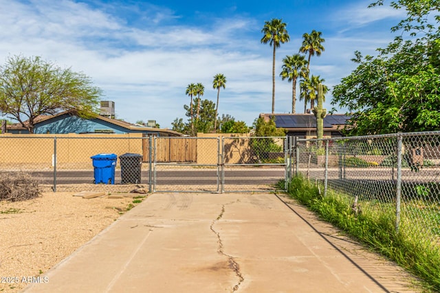 4343 E Union Hills Dr, Phoenix, AZ 85050 - view of street with driveway, a gated entry, and a gate