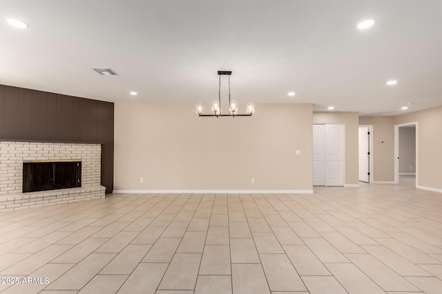 8124 N 45th Ave, Glendale, AZ 85302 - unfurnished living room featuring recessed lighting, baseboards, and a brick fireplace