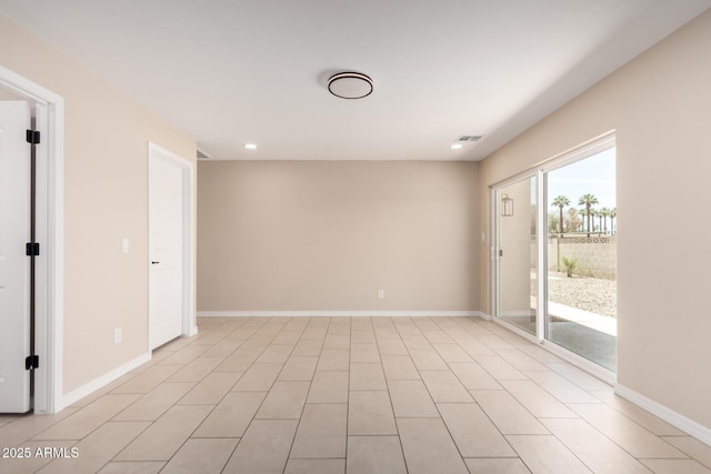 8124 N 45th Ave, Glendale, AZ 85302 - spare room featuring baseboards and recessed lighting