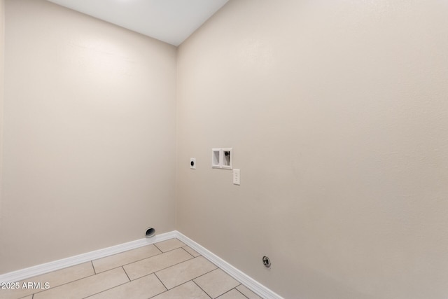 8124 N 45th Ave, Glendale, AZ 85302 - laundry room with hookup for an electric dryer, washer hookup, light tile patterned flooring, and baseboards