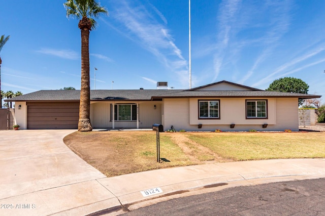 8124 N 45th Ave, Glendale, AZ 85302 - single story home with driveway, a garage, and a front yard