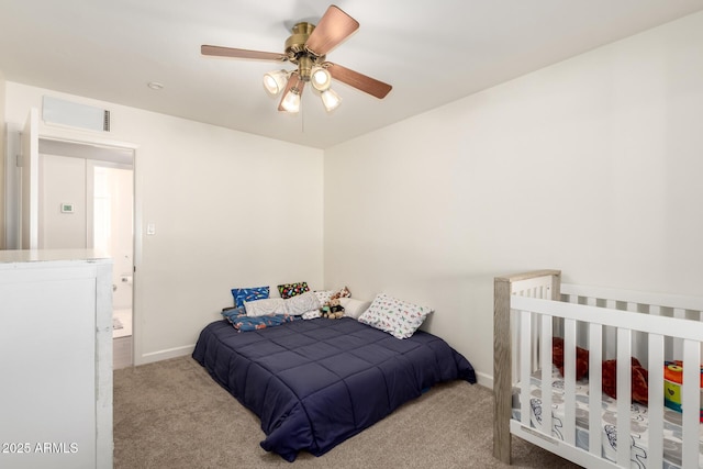 bedroom with visible vents, baseboards, a ceiling fan, and carpet flooring