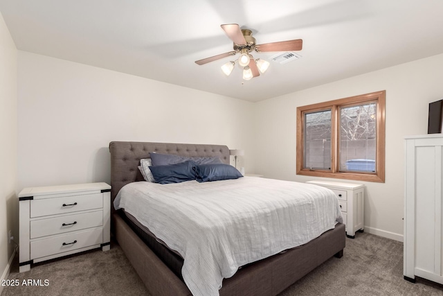 bedroom featuring visible vents, baseboards, carpet, and a ceiling fan