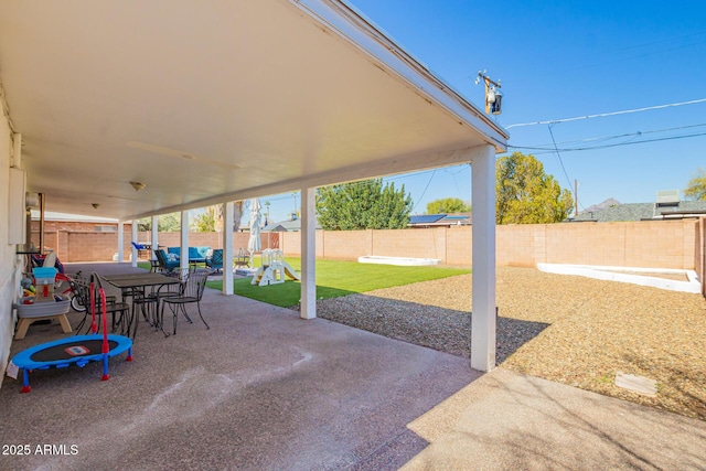 view of patio / terrace featuring a fenced backyard and outdoor dining space