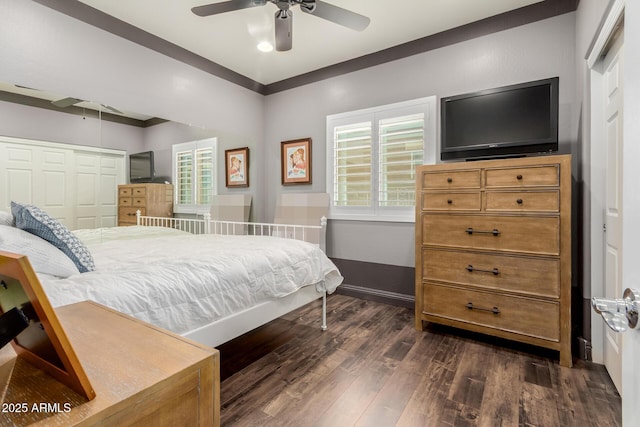 10738 W Rowel Rd, Peoria, AZ 85383 - bedroom with dark wood-style floors, a ceiling fan, and a closet