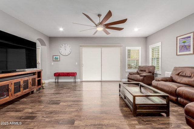 10738 W Rowel Rd, Peoria, AZ 85383 - living room with a ceiling fan, wood finished floors, recessed lighting, baseboards, and arched walkways