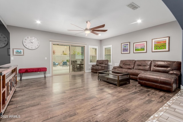 10738 W Rowel Rd, Peoria, AZ 85383 - living room featuring a ceiling fan, wood finished floors, recessed lighting, baseboards, and arched walkways