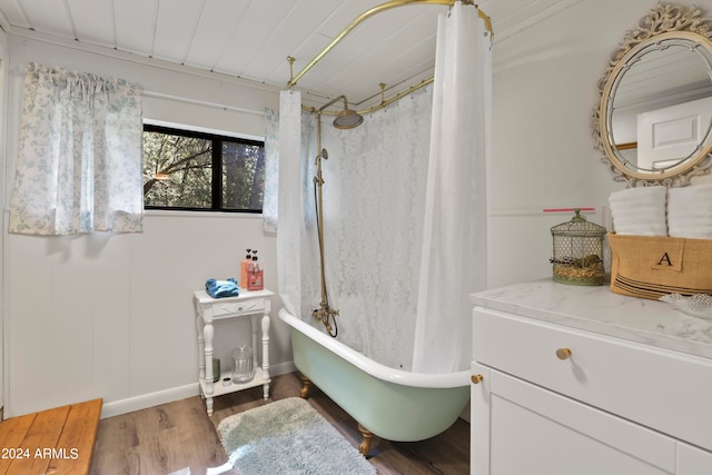 bathroom featuring shower / tub combo, vanity, and hardwood / wood-style flooring