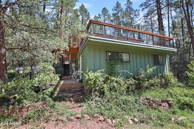 view of property exterior with a balcony