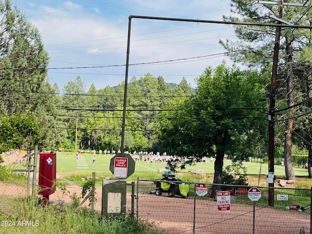 view of home's community featuring a yard