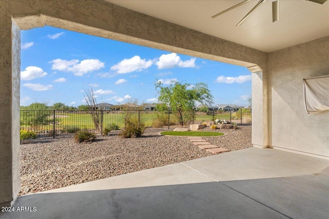 view of patio / terrace featuring ceiling fan