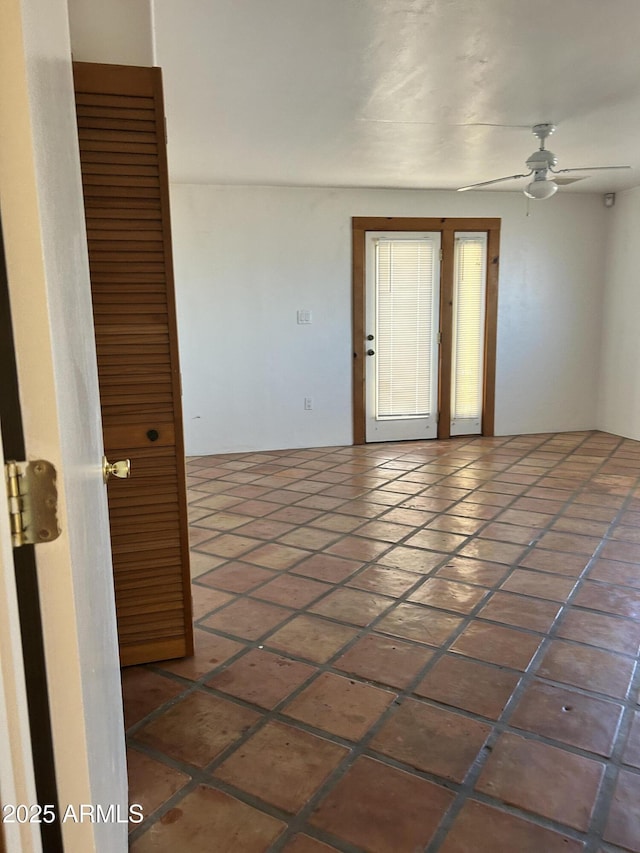902 S Una Ave, Tempe, AZ 85281 - spare room with tile patterned flooring and a ceiling fan