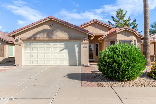 view of front of property featuring a garage