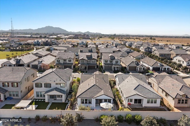 birds eye view of property featuring a mountain view