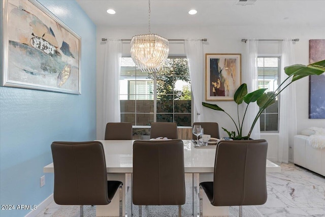 dining room with a chandelier