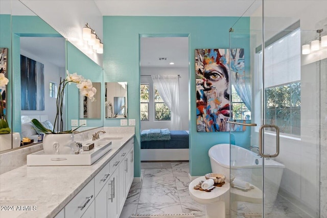 bathroom featuring vanity and a shower with shower door