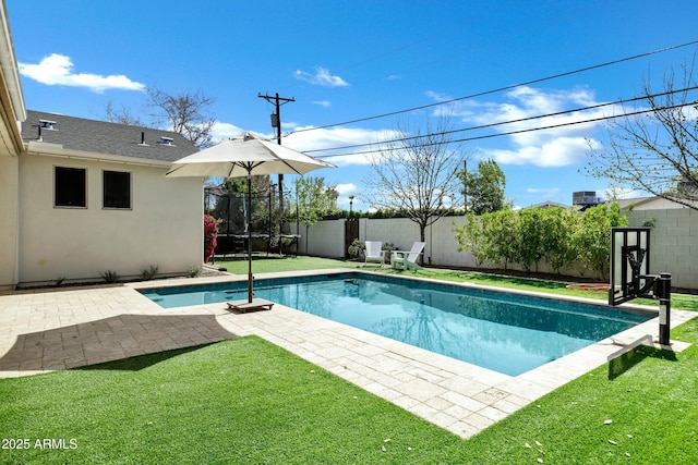 view of pool with a fenced backyard, a lawn, a patio, and a fenced in pool