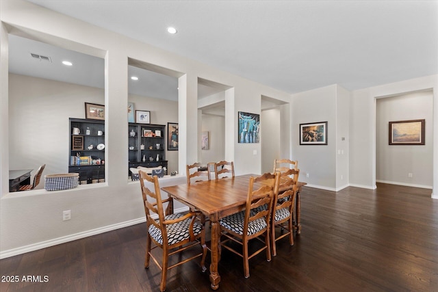 dining room featuring dark hardwood / wood-style floors