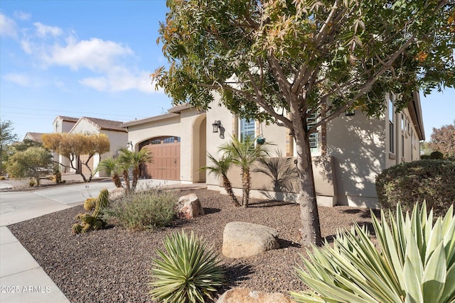 view of front of property featuring a garage